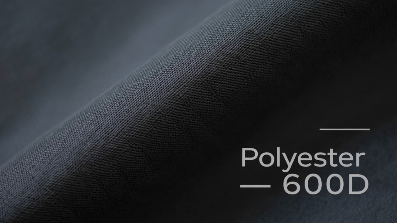 Tightly woven 600D polyester fabric with matte finish and durable texture.